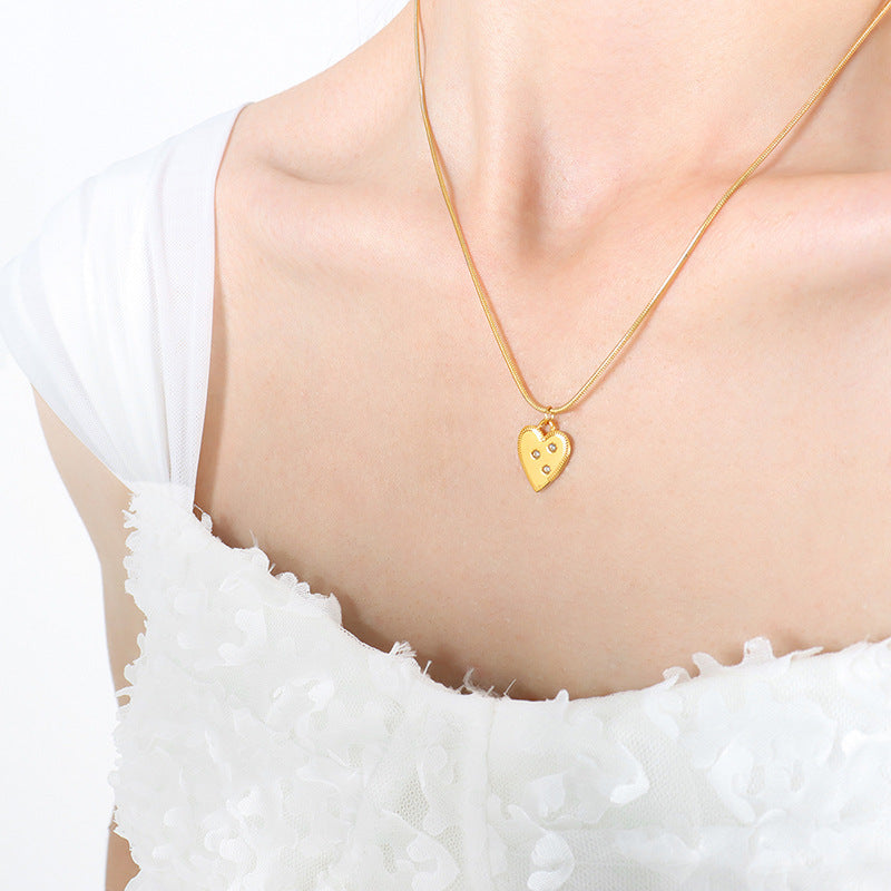 Gold Steel Heart Charm Necklace with CZ Accents