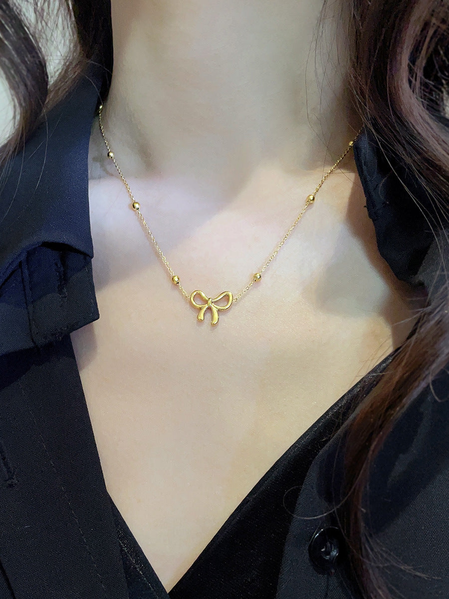 Gold Steel Satellite Chain Necklace with Bow Charm