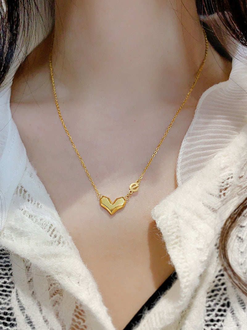 Gold Steel Heart Charm Necklace